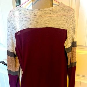 Maurices long sleeve multi color top with front knot.